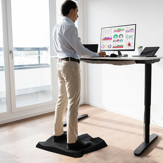 Black portable anti-fatigue standing desk mat with diverse terrain and built-in ergonomic massage pressure points — view 2