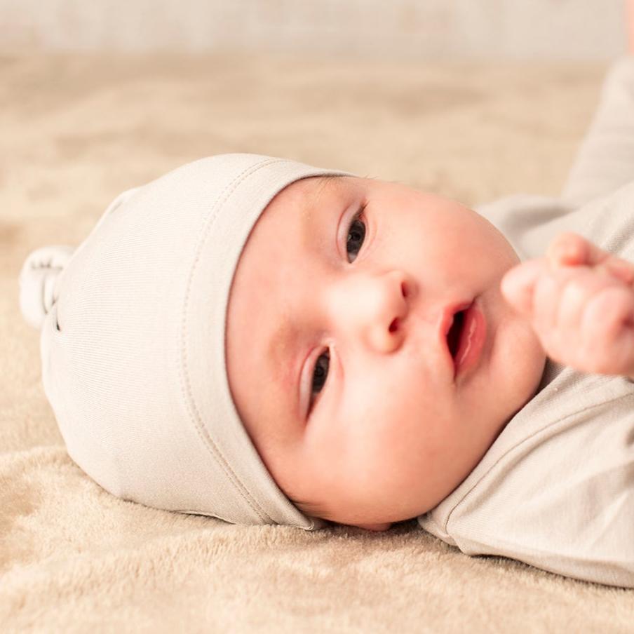 Grey bamboo baby beanie, soft stretchy headwear accessory for sensitive newborn skin. — view 2
