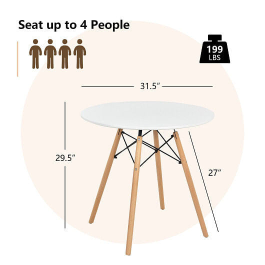 White round modern dining table with solid beech wood legs on a clean hardwood floor — view 5