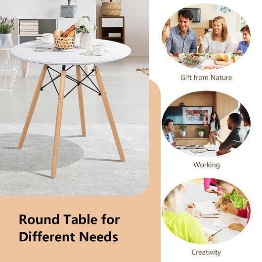 White round modern dining table with solid beech wood legs on a clean hardwood floor — view 3