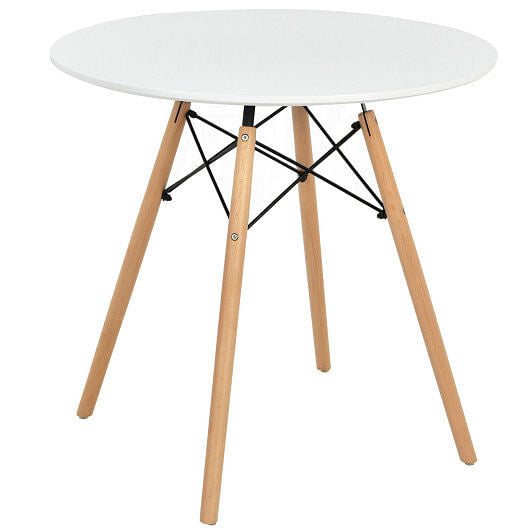 White round modern dining table with solid beech wood legs on a clean hardwood floor