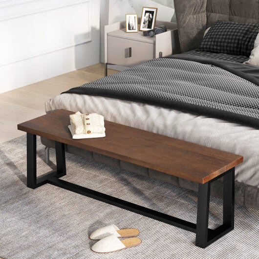 Rustic acacia wood dining bench with black metal frame and adjustable footpads for indoor seating. — view 2