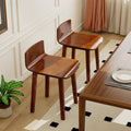 Set of two natural acacia wood mid-century modern armless dining chairs with curved low backrests