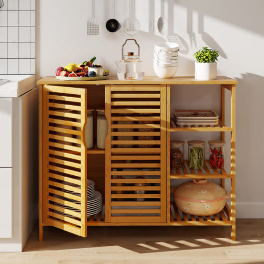 Natural bamboo bathroom cabinet with two doors and open shelves on a white background