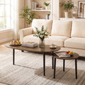 Two mid century walnut finish nesting tables with rounded edges and solid rubber wood legs