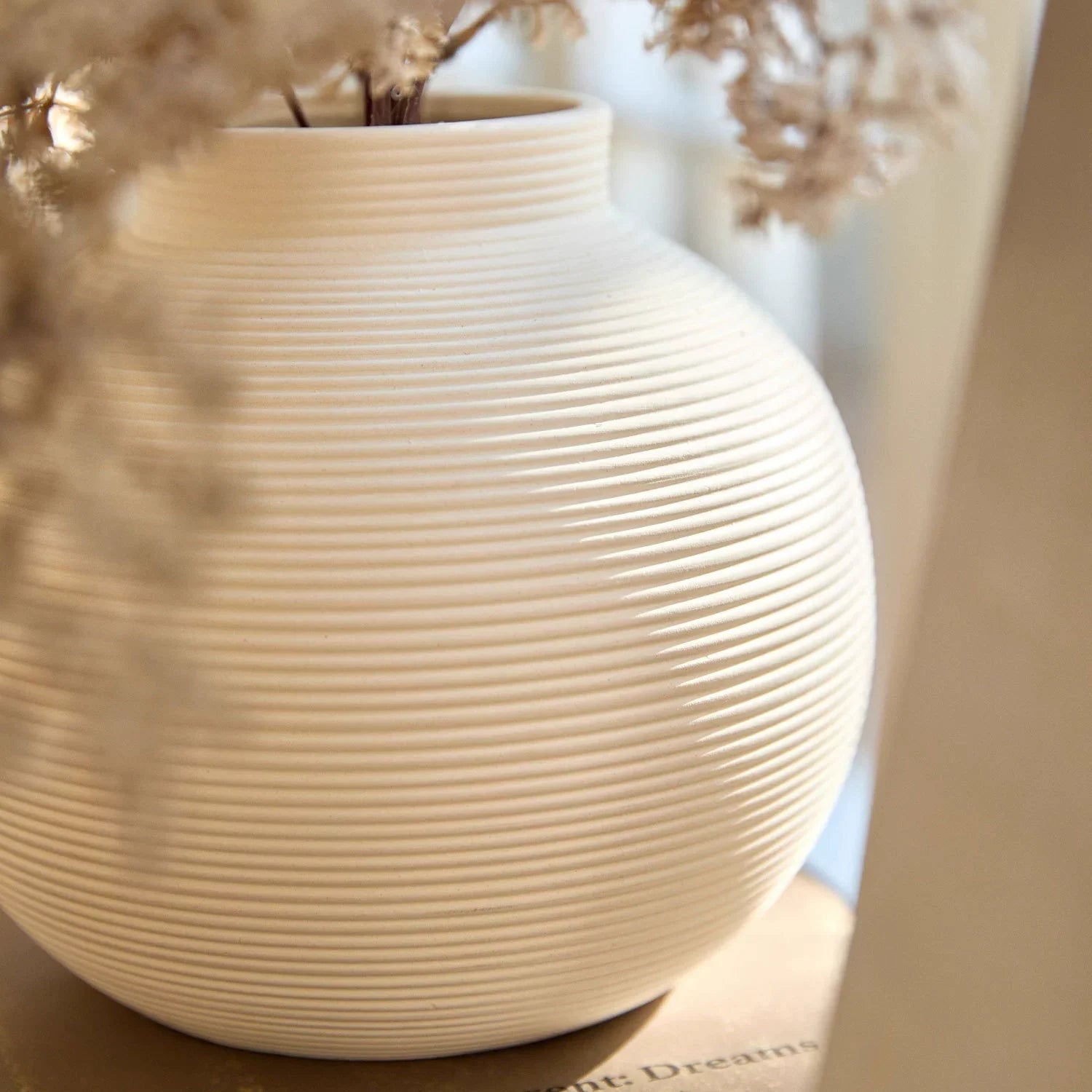Minimalist ribbed ceramic vase in matte white, elegant unglazed textured centerpiece for modern home decor — view 3
