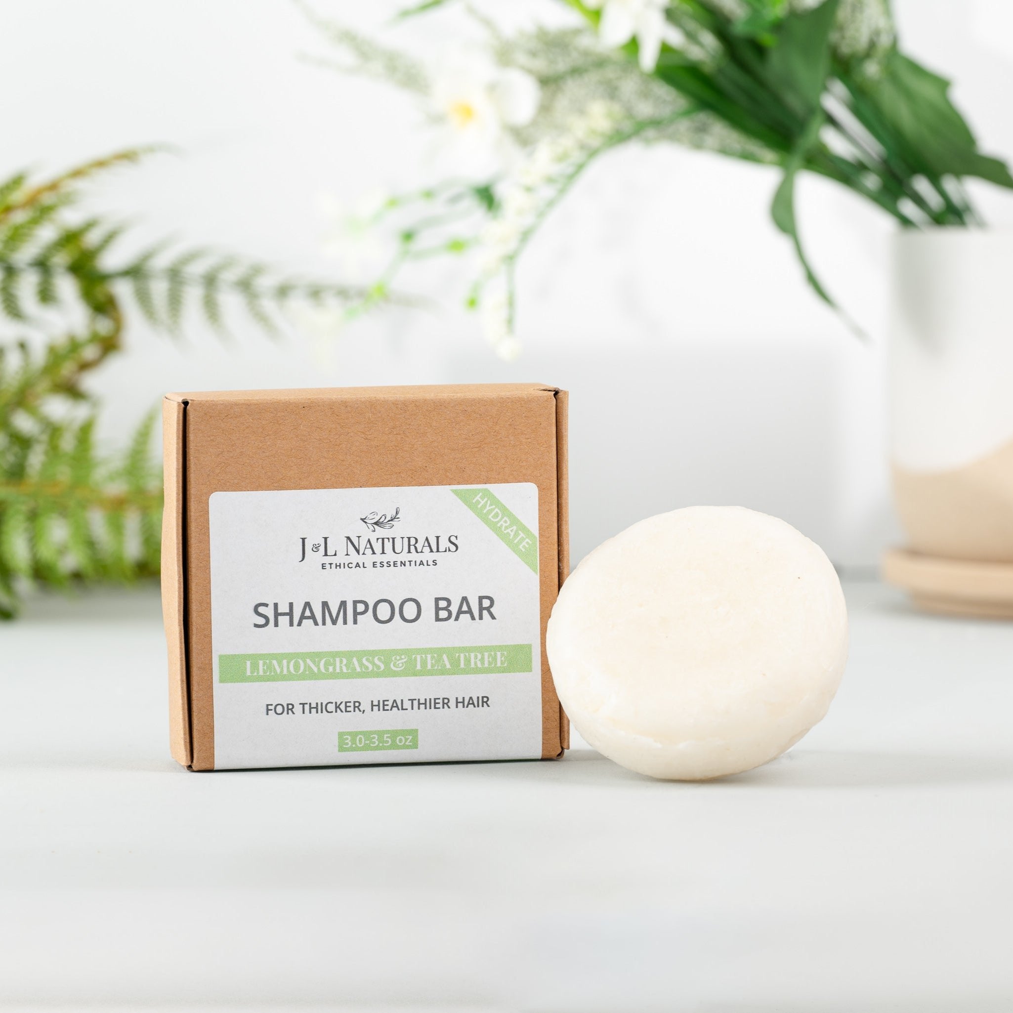 Sulfate-free shampoo bar showing natural botanical texture and eco-friendly plastic-free packaging. — view 4