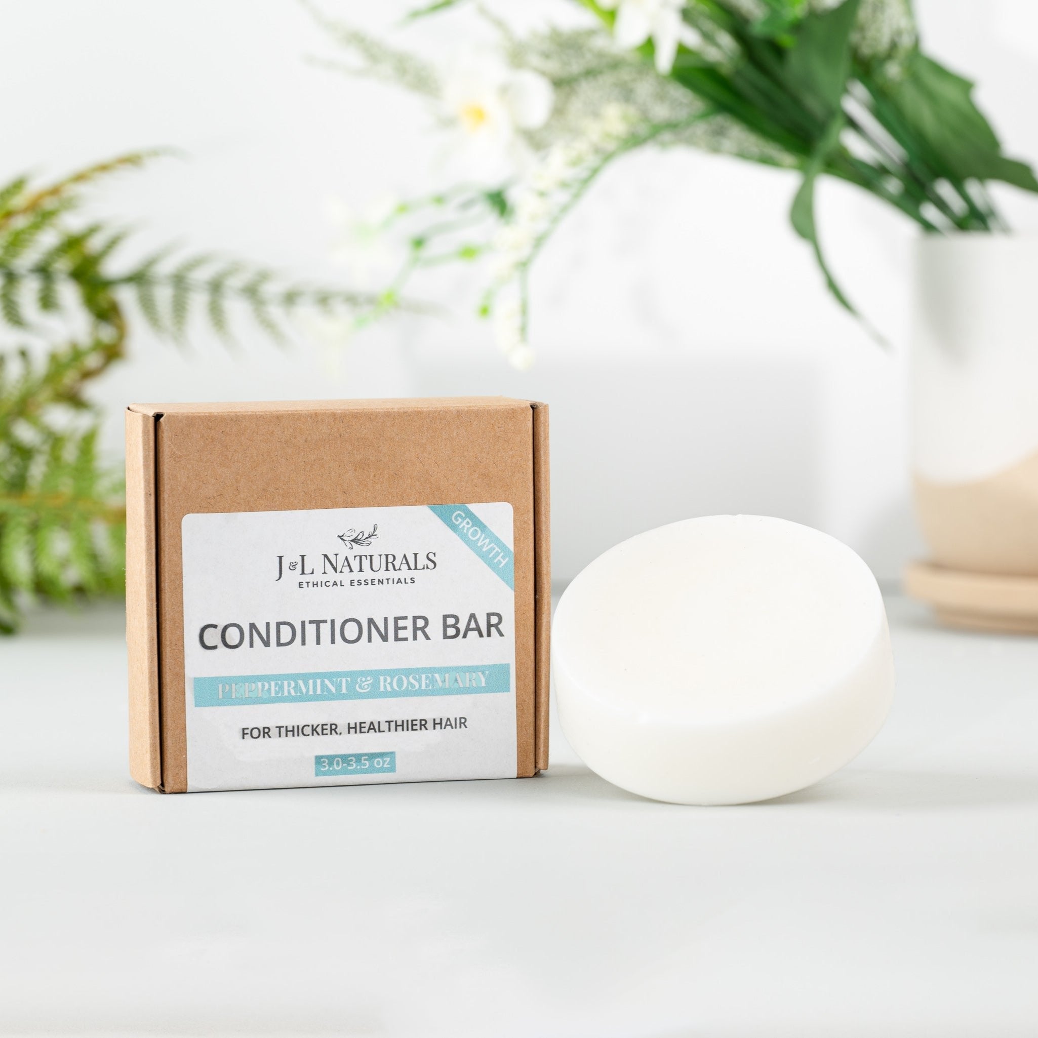 Sulfate-free conditioner bar crafted from natural plant butters and botanical oils in solid form — view 4