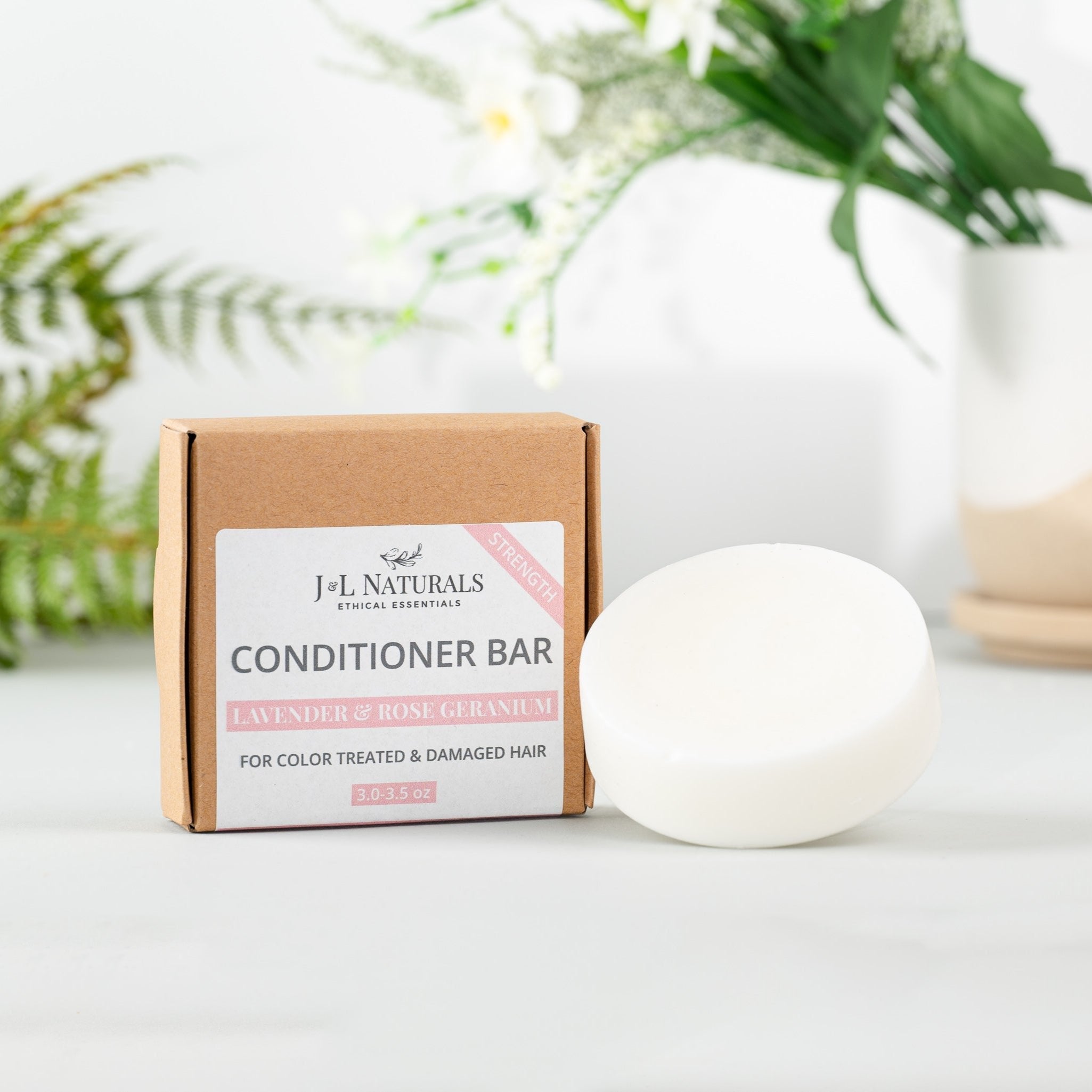 Sulfate-free conditioner bar crafted from natural plant butters and botanical oils in solid form — view 5