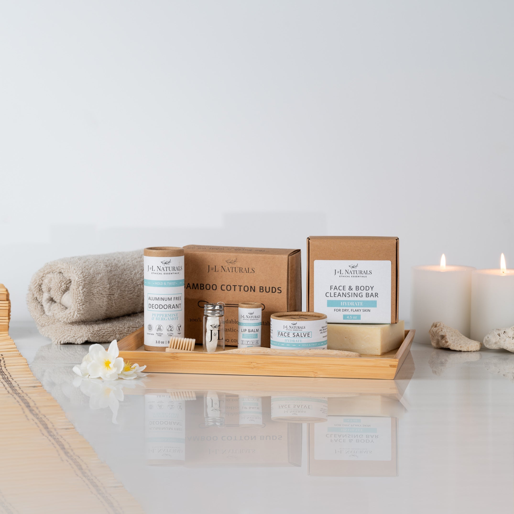Essentials 7-piece natural self care kit with cleanser, salve, lip balm, and bamboo toothbrush — view 3