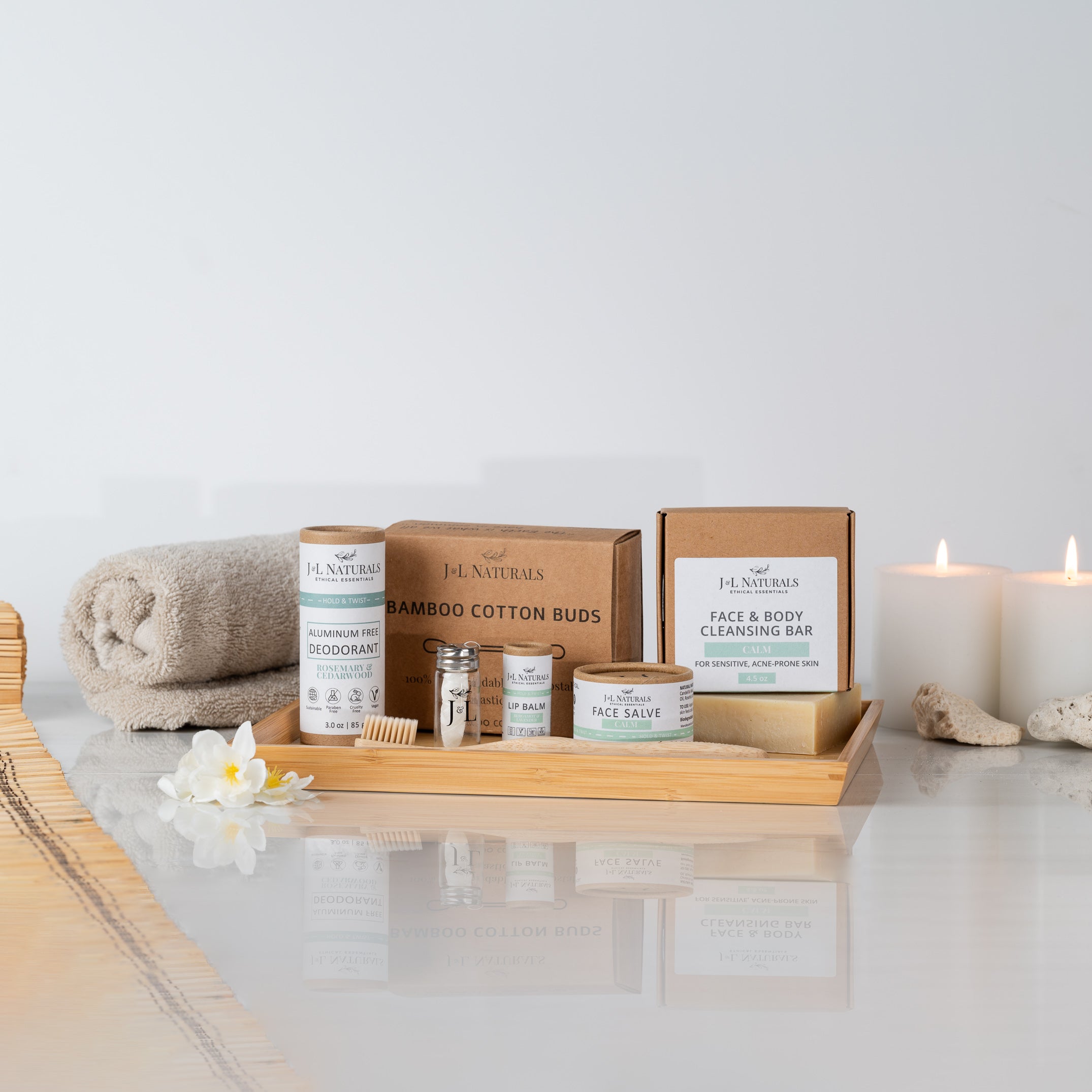 Essentials 7-piece natural self care kit with cleanser, salve, lip balm, and bamboo toothbrush — view 4