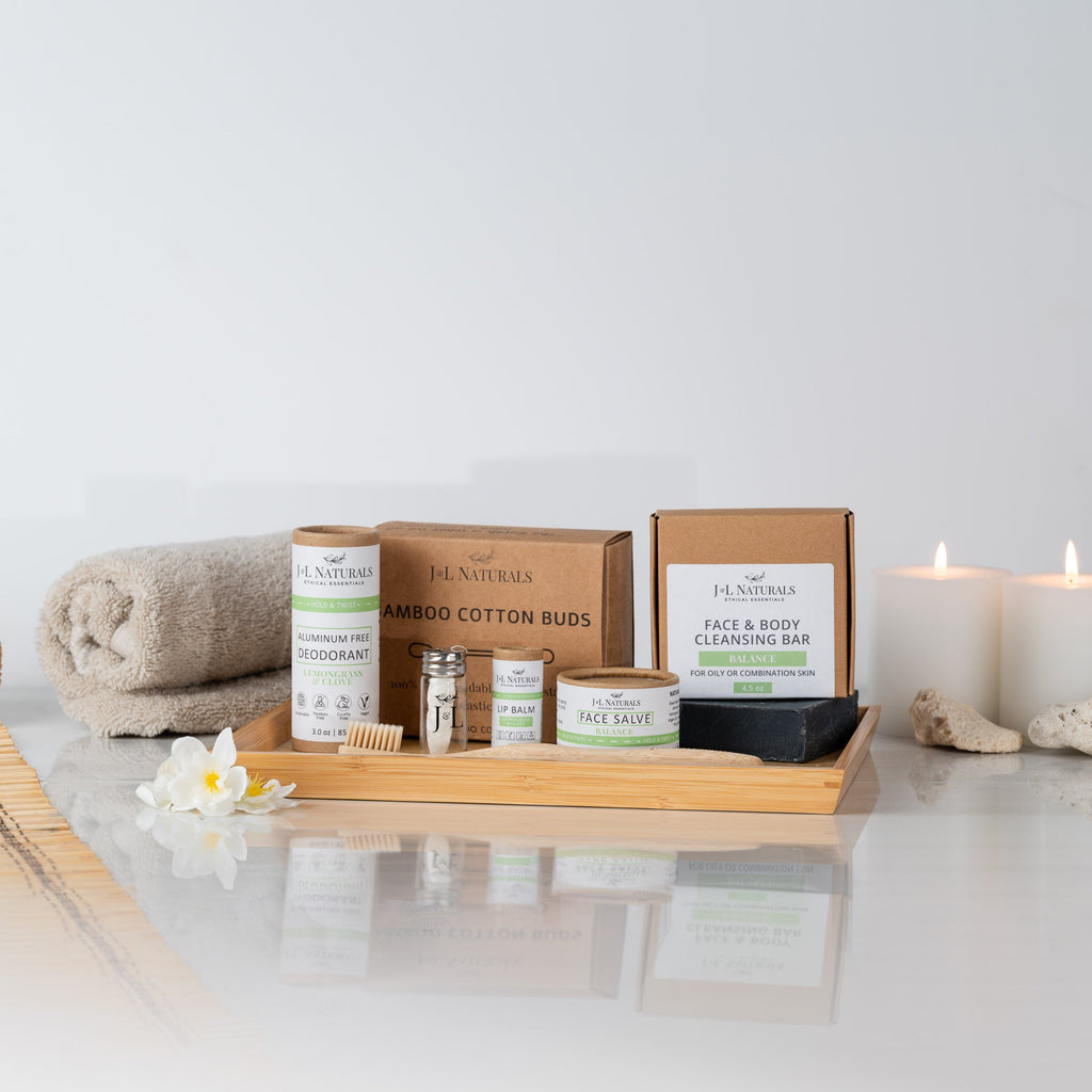 Essentials 7-piece natural self care kit with cleanser, salve, lip balm, and bamboo toothbrush — view 2
