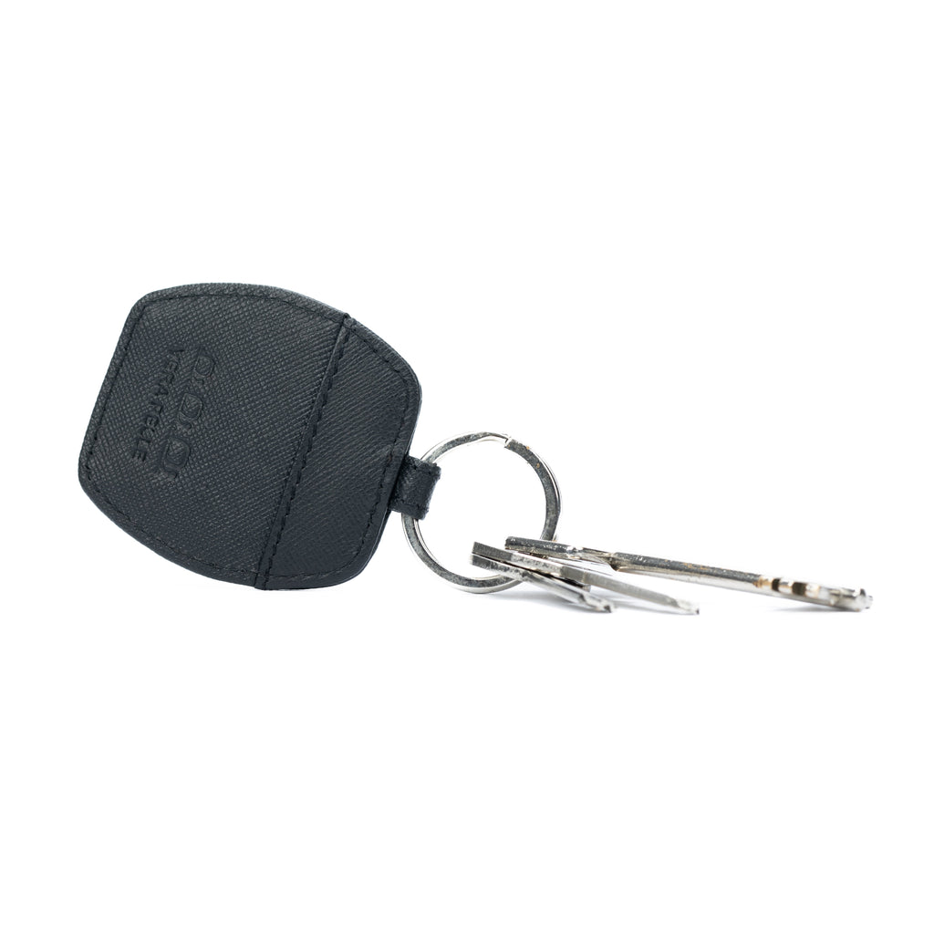 Black Saffiano genuine leather keychain with polished nickel ring next to a rigid gift box — view 3