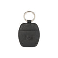 Black Saffiano genuine leather keychain with polished nickel ring next to a rigid gift box