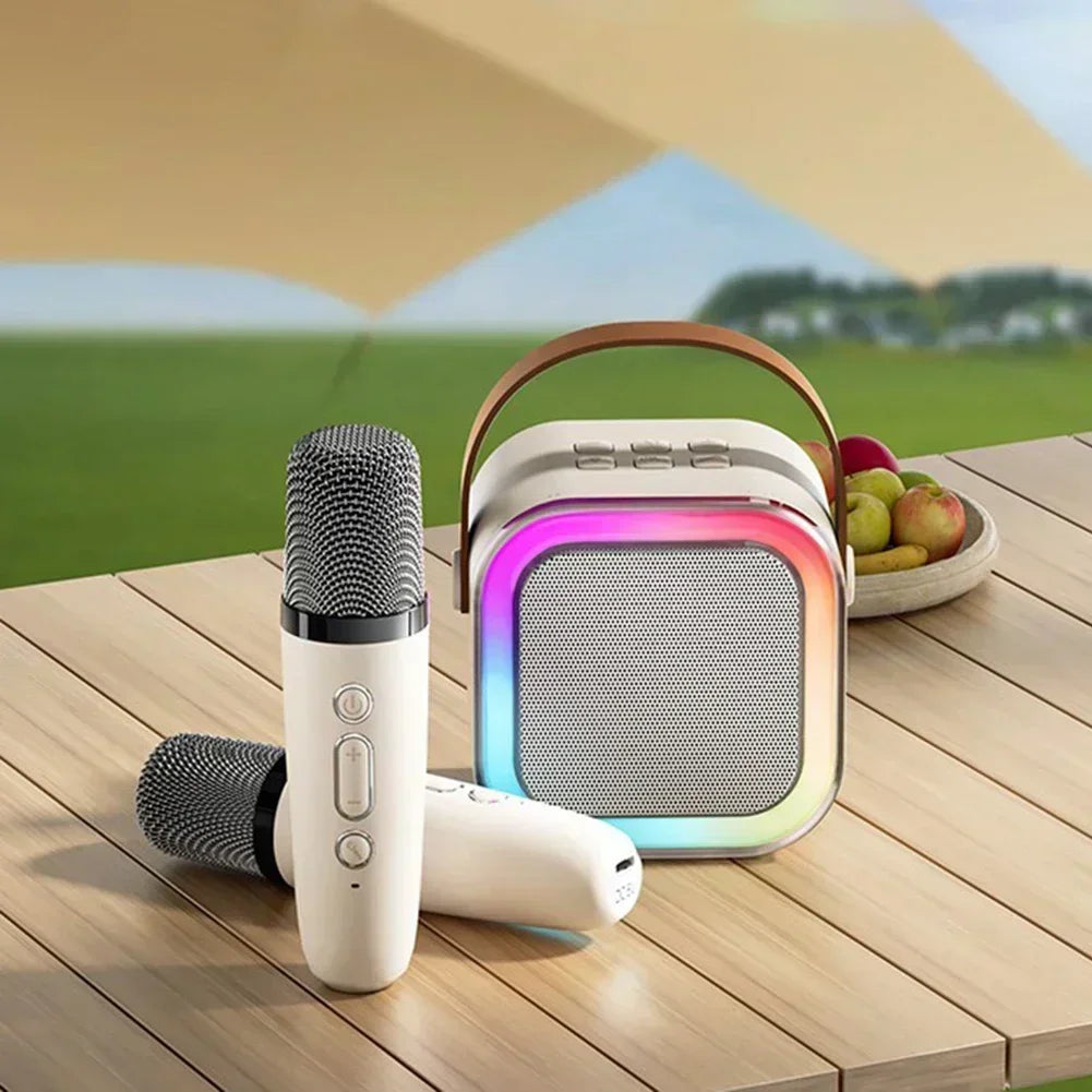 White K12 Bluetooth karaoke machine with RGB lights, wireless microphone, and premium leather carrying handle — view 3