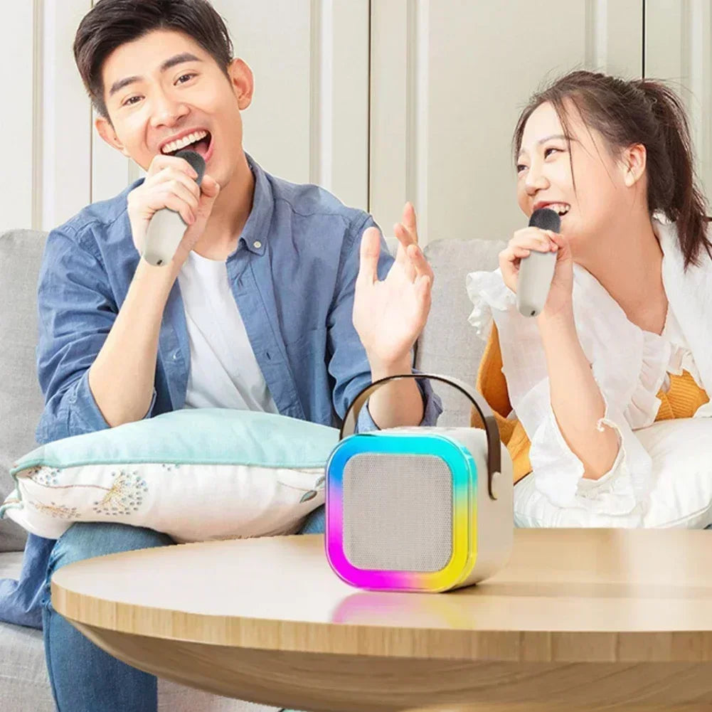 White K12 Bluetooth karaoke machine with RGB lights, wireless microphone, and premium leather carrying handle — view 4