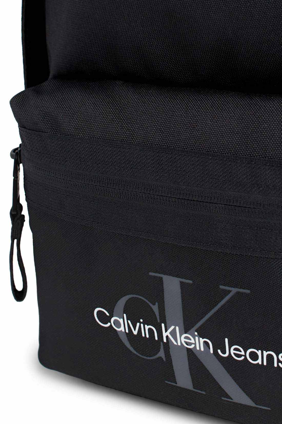 Black Calvin Klein Men's recycled nylon backpack with front zip pocket and padded shoulder straps — view 2