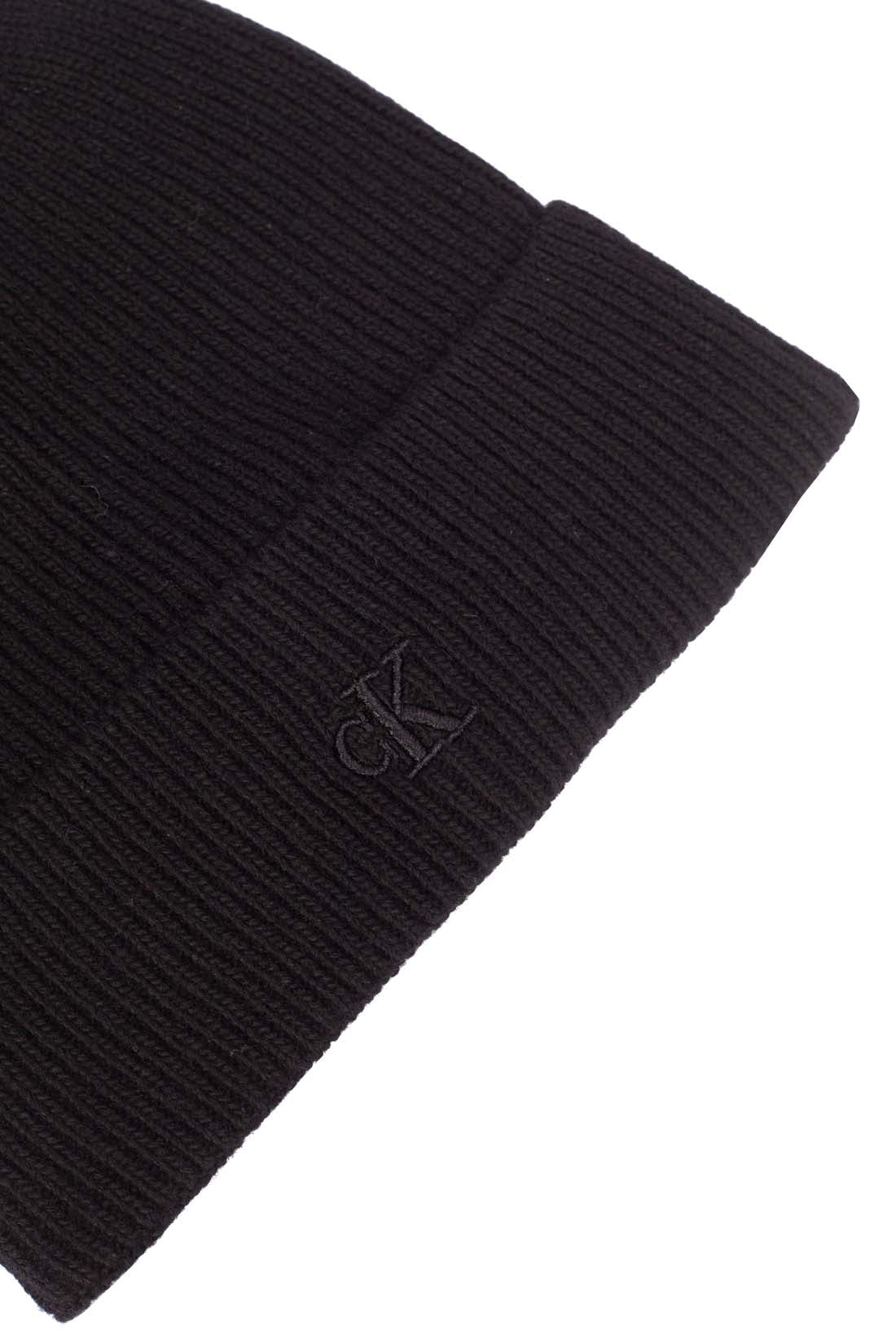 Men's black knitted wool and cashmere blend beanie with embroidered monogram logo on the front — view 5