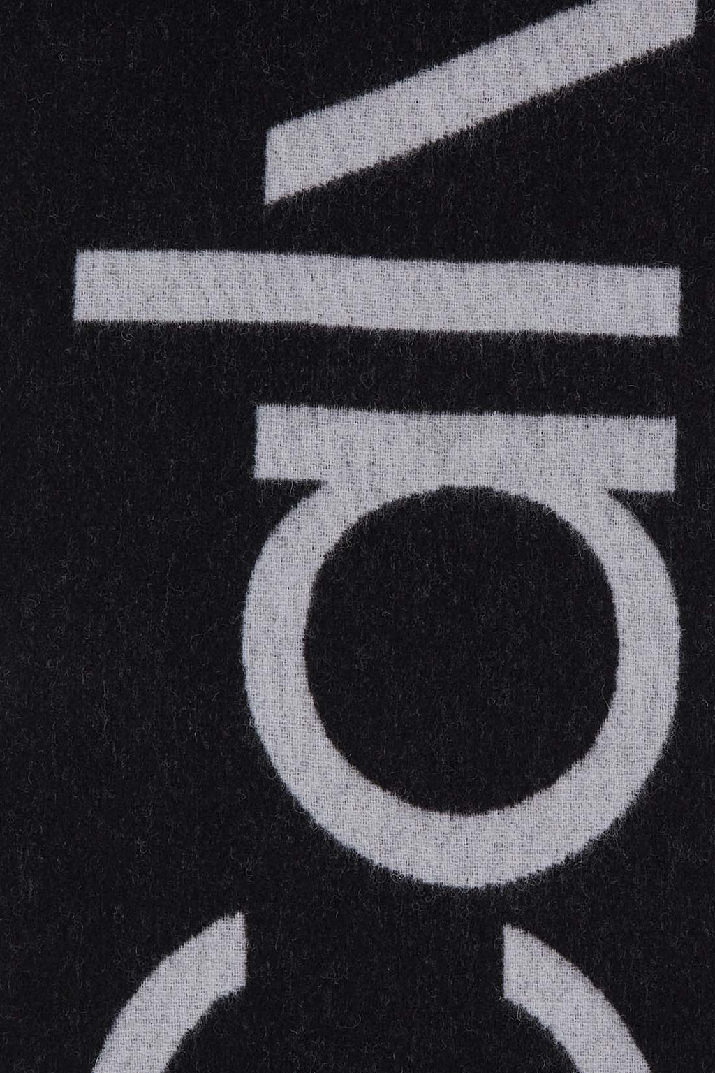 Men's black wool scarf with classic fringes and subtly integrated designer logo inlay