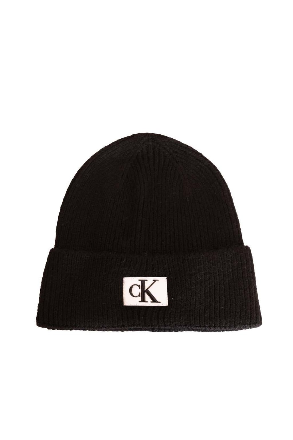 Men's black ribbed knit beanie with folded cuff and front designer logo patch. — view 6