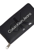 Women's zip-around wallet in smooth black faux-leather with Calvin Klein linear logo