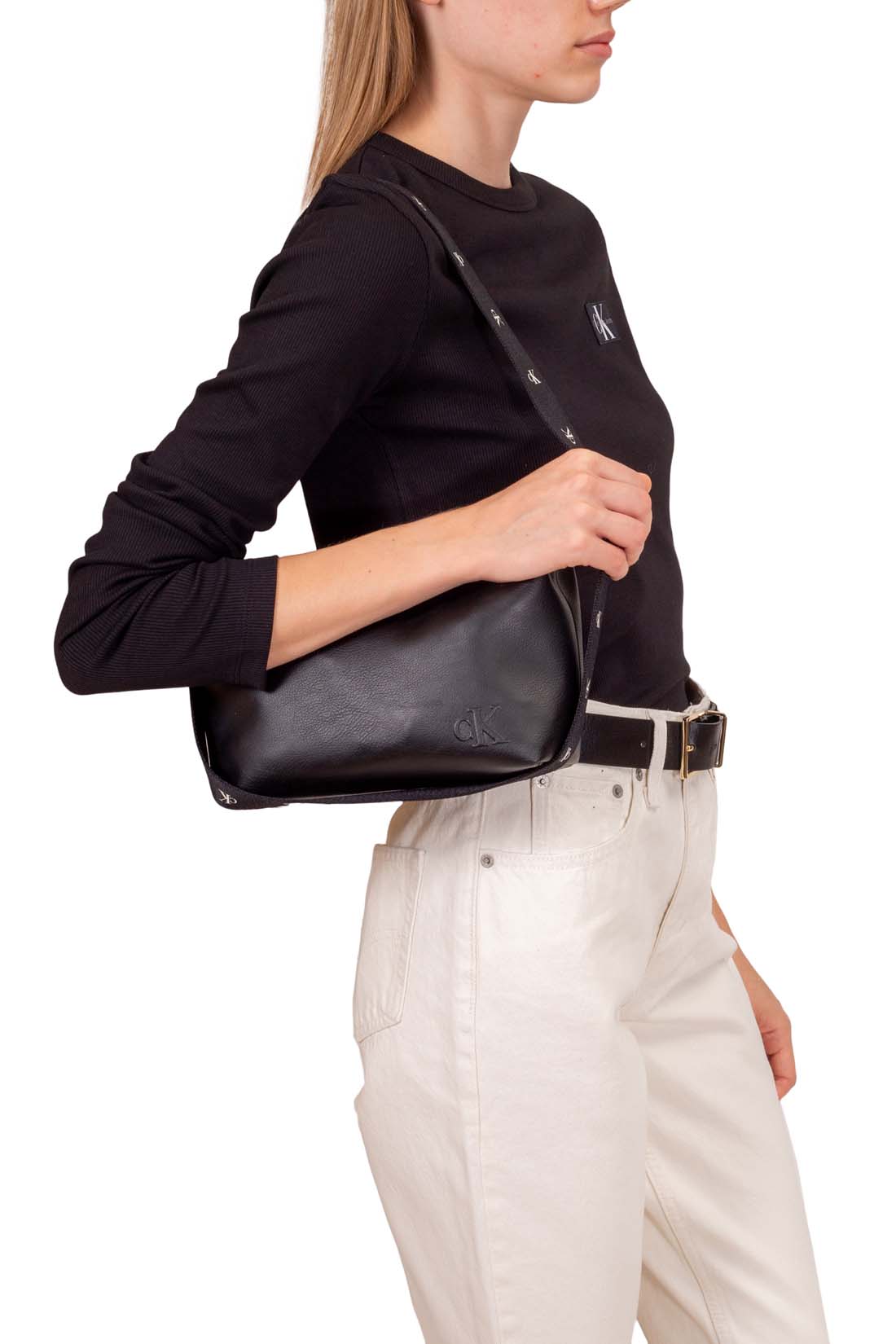 Black faux leather Calvin Klein shoulder bag with adjustable printed monogram strap and logo details — view 4