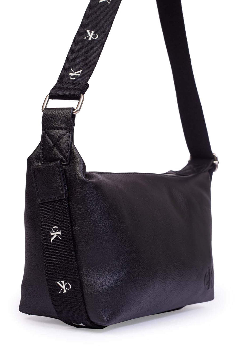 Black faux leather Calvin Klein shoulder bag with adjustable printed monogram strap and logo details — view 7