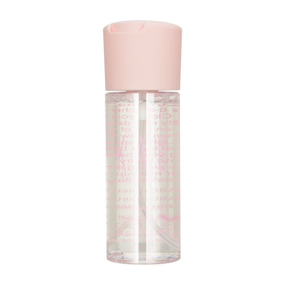 Hydrating setting mist spray bottle showcasing fine mist applicator and fresh coconut water formula — view 5