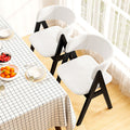 Mid-century modern dining chairs set of two with black wood frames and white sherpa upholstery