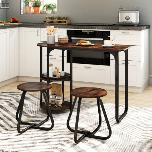 3-piece industrial black dining table set with two stools tucked underneath and side shelves