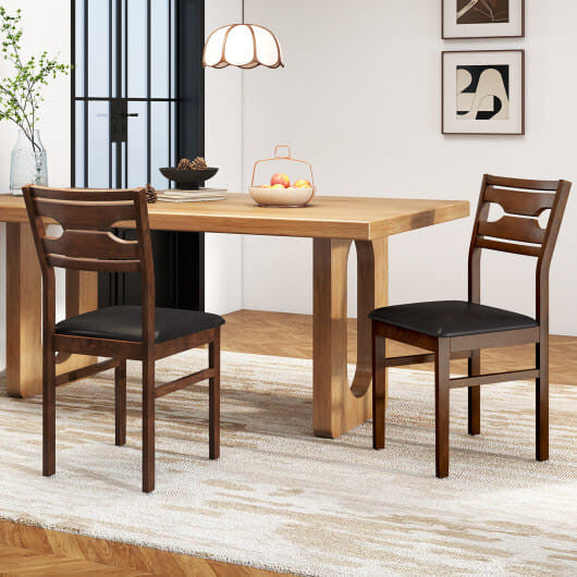 Walnut wooden dining chairs set of two with sleek black PU leather padded seats — view 2