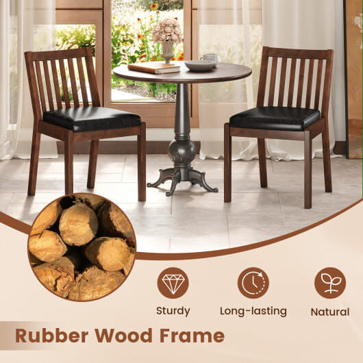 Two espresso PU leather upholstered dining chairs with natural rubber wood frames and slatted backrests. — view 4