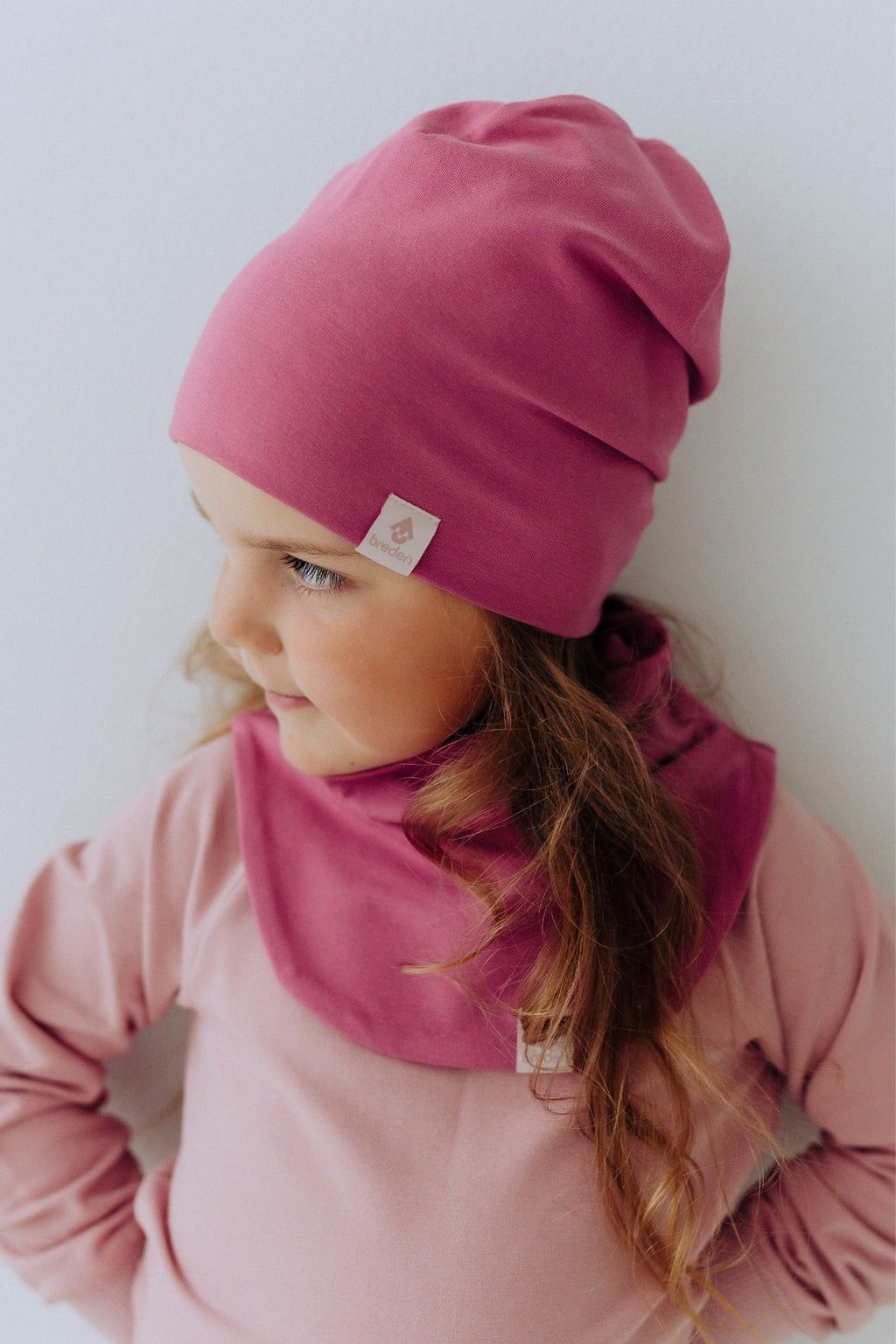 Double layered cotton kids beanie hat shown in a relaxed baggy style for autumn weather — view 3
