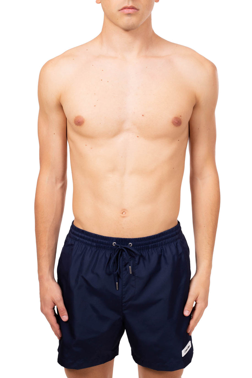 Blue Calvin Klein men's swim shorts with elastic waistband, drawstring, and white patch logo. — view 10