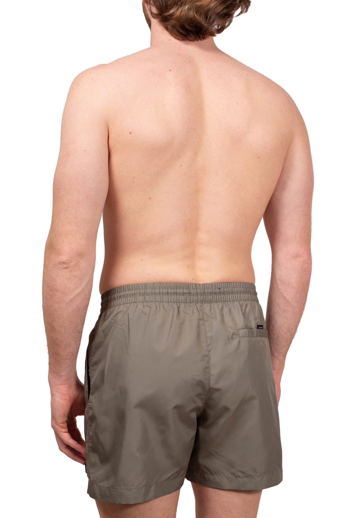 Blue Calvin Klein men's swim shorts with elastic waistband, drawstring, and white patch logo. — view 7