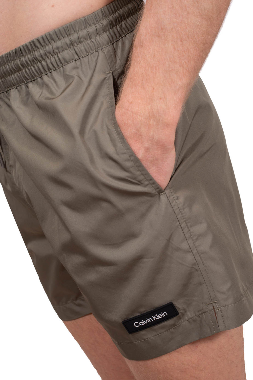 Blue Calvin Klein men's swim shorts with elastic waistband, drawstring, and white patch logo. — view 5