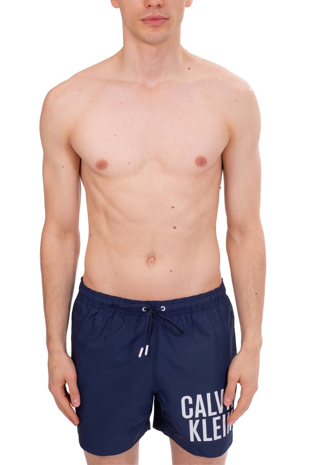 Navy blue men's swim shorts with bold printed logo, elasticated drawstring waistband, and regular fit. — view 6