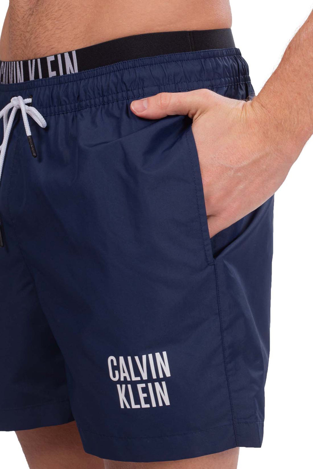 Men's red swim shorts with contrast logo waistband, drawstring, and front pockets. — view 5