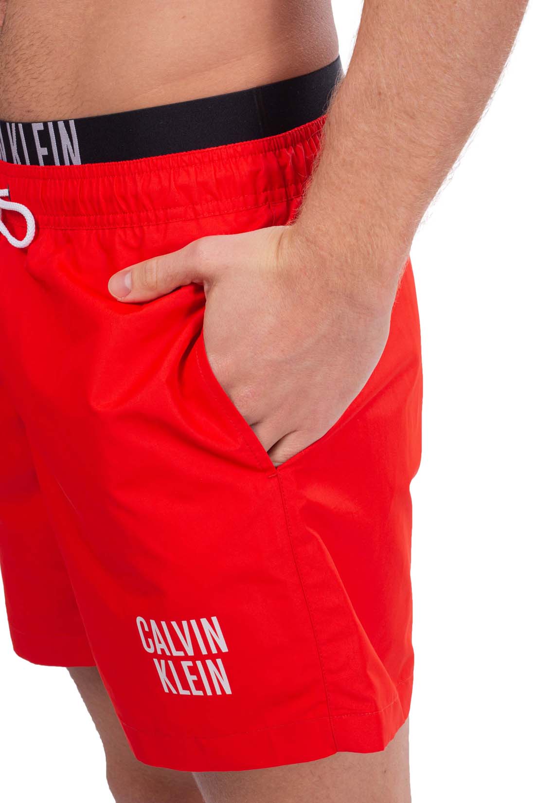 Men's red swim shorts with contrast logo waistband, drawstring, and front pockets. — view 9