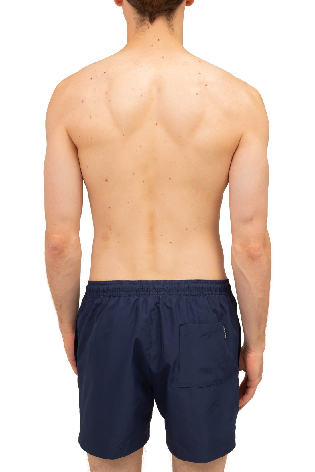 Calvin Klein men's blue quick-dry swim shorts with contrasting white front monogram and drawstring elastic waistband — view 27