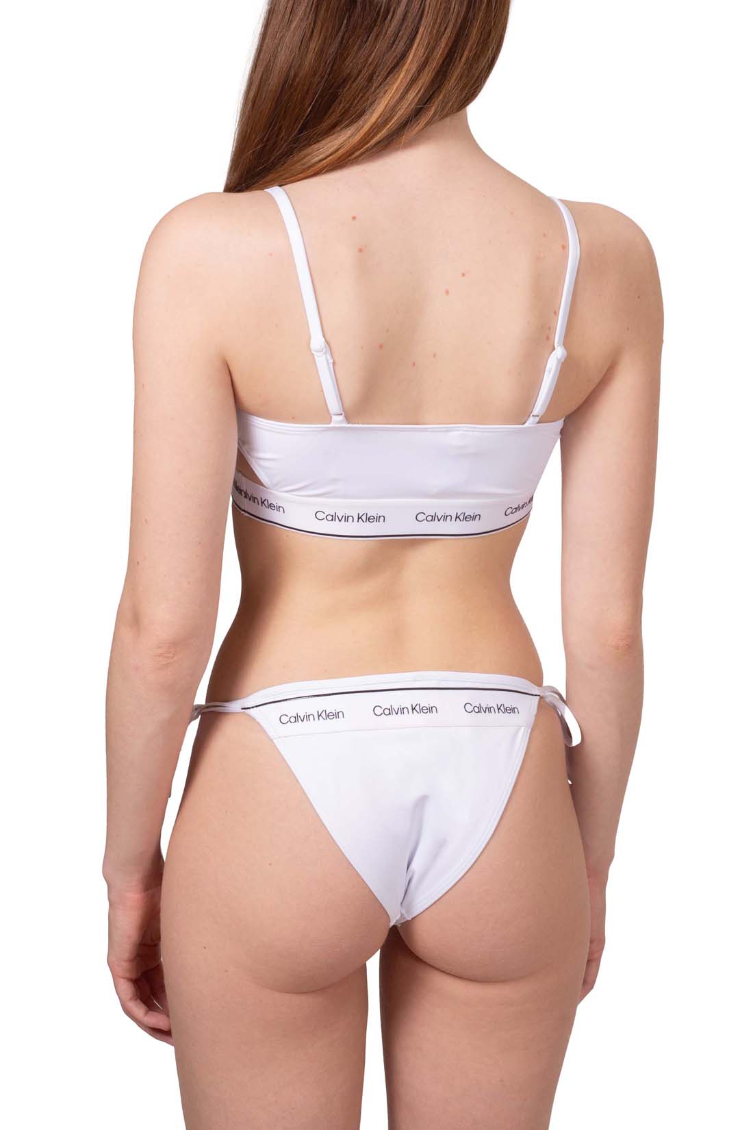 White stretch nylon bikini brief with side tie laces and signature Calvin Klein logo detail — view 13