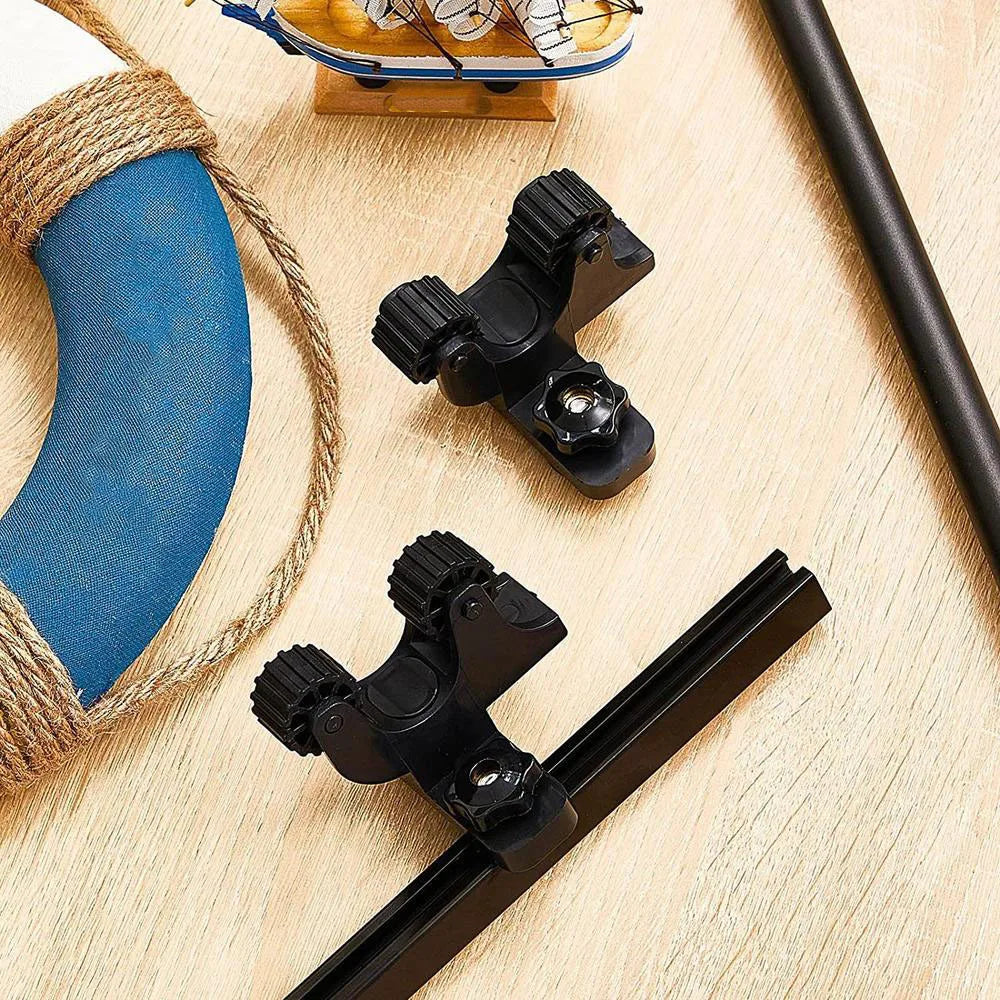 Adjustable kayak paddle holder in black ABS plastic mounted on a boat track — view 5