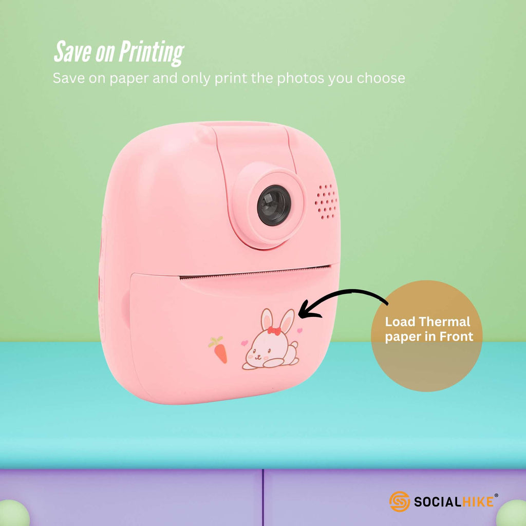 Pink kids instant print camera with bunny decal featuring built-in screen and thermal paper roll — view 4