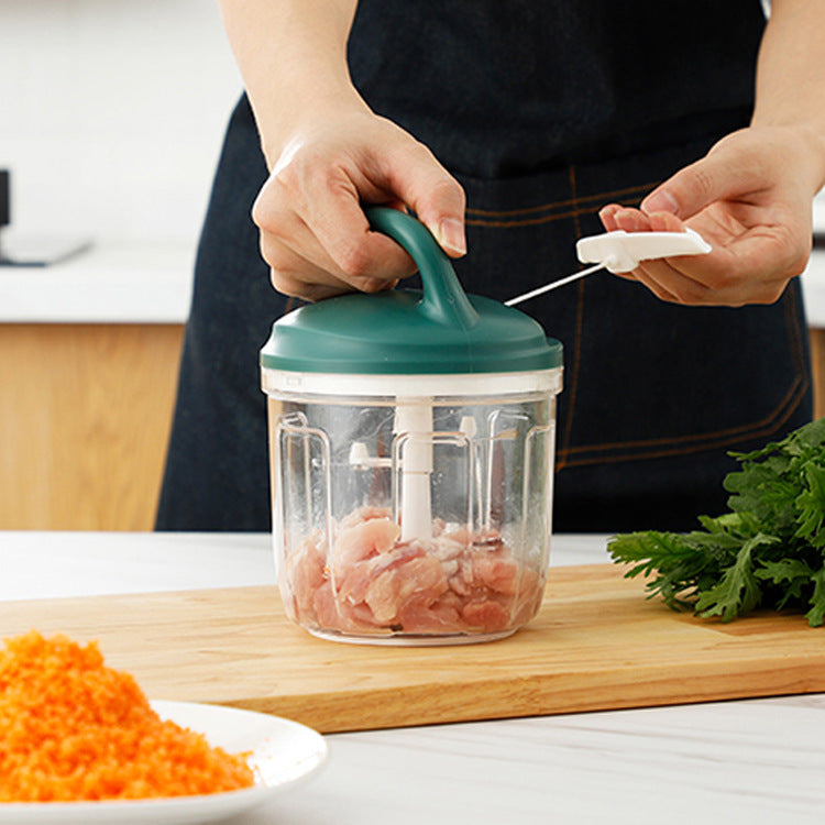Grey compact vegetable chopper with stainless steel blades and 200ml transparent food container.