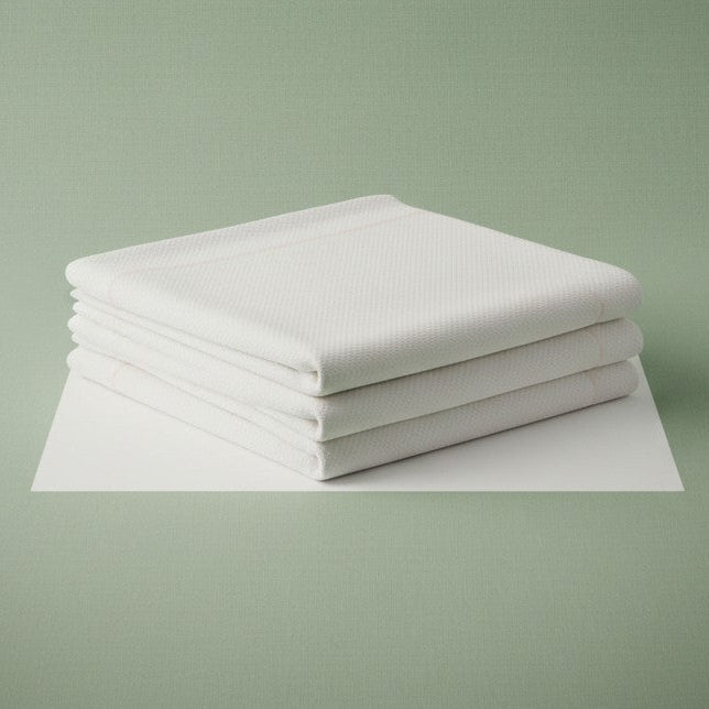 White cotton blend knitted fitted sheet and medical stretcher sheet with ceil blue accents — view 2