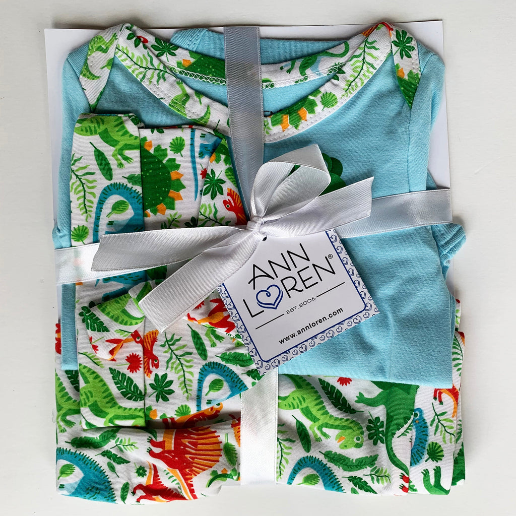 3-piece dinosaur baby layette set with green and white bodysuit, jogger pants, and cap — view 2