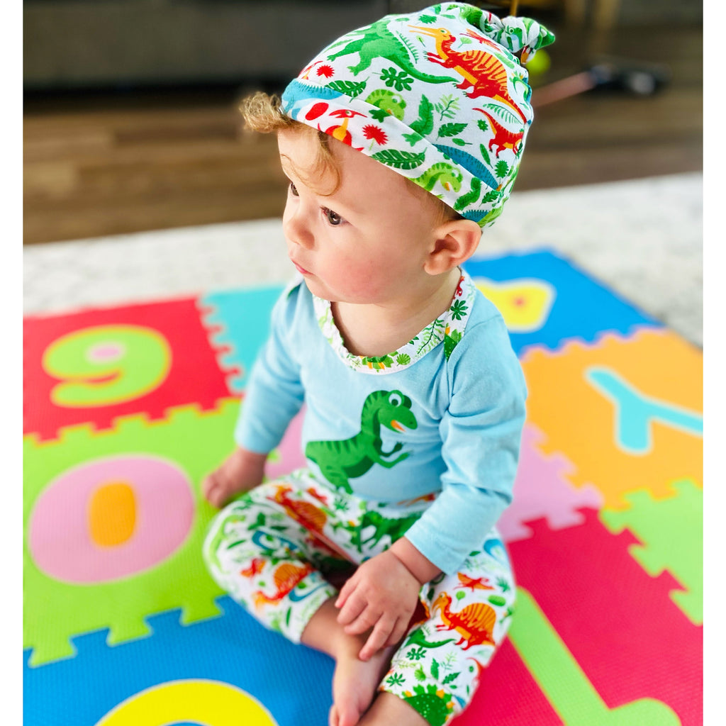 3-piece dinosaur baby layette set with green and white bodysuit, jogger pants, and cap — view 5