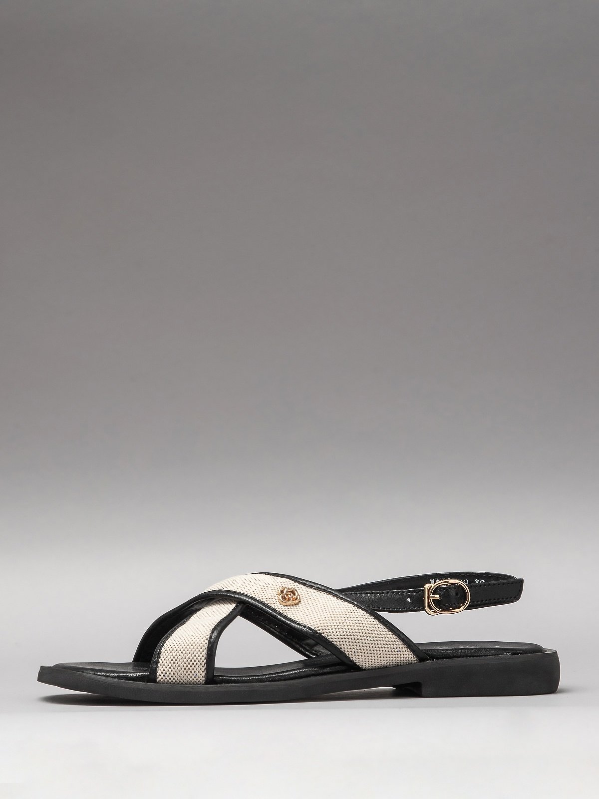 Elegant black leather women's sandals by L'ARTE MILANO, featuring comfortable textile details and supportive soles.