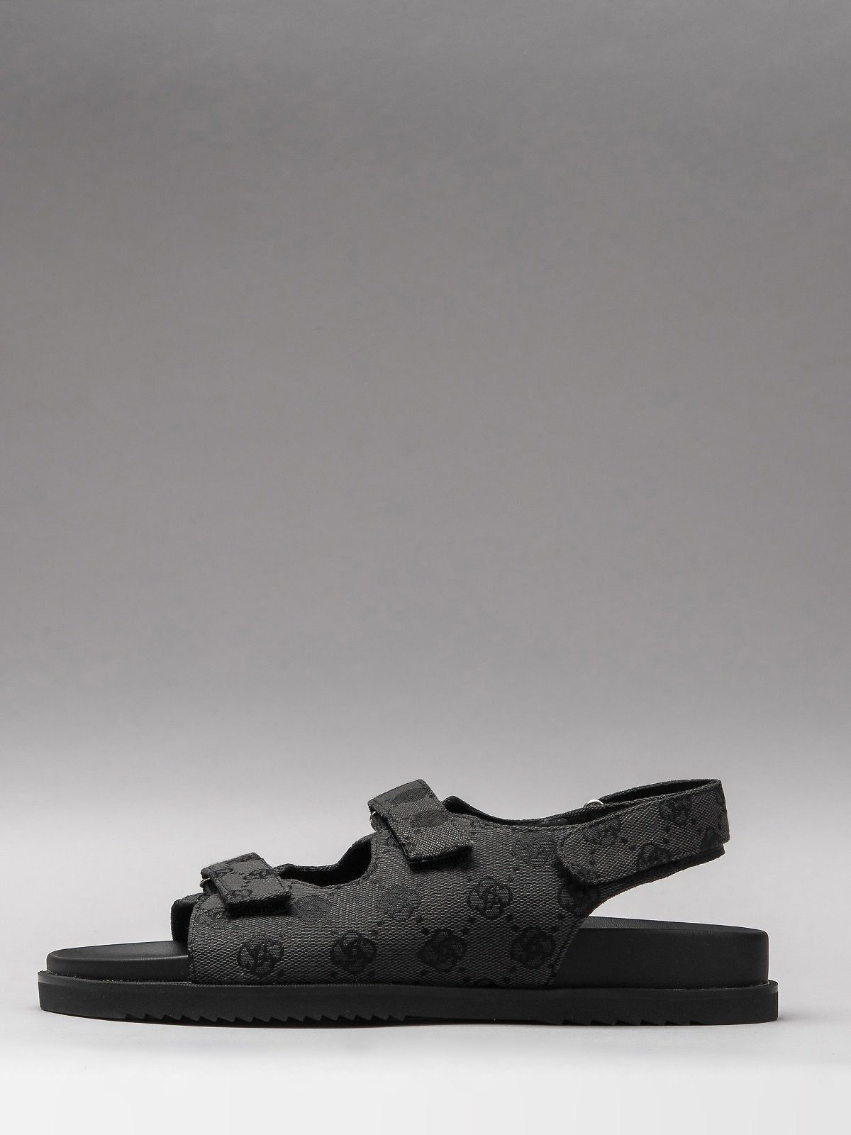 Women's grey summer sandals featuring genuine leather interior and sturdy synthetic sole