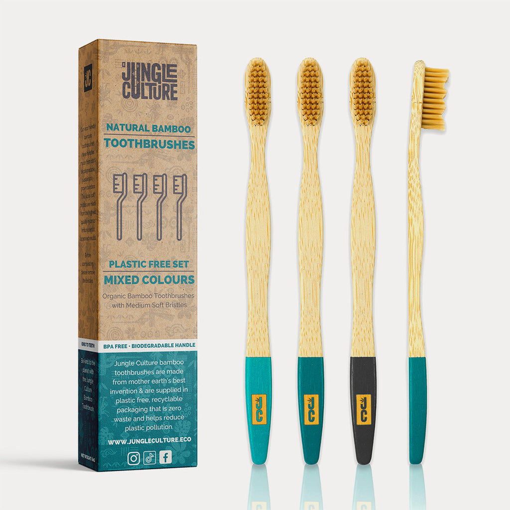 Set of four natural bamboo toothbrushes with soft bristles in zero waste kraft paper packaging — view 3